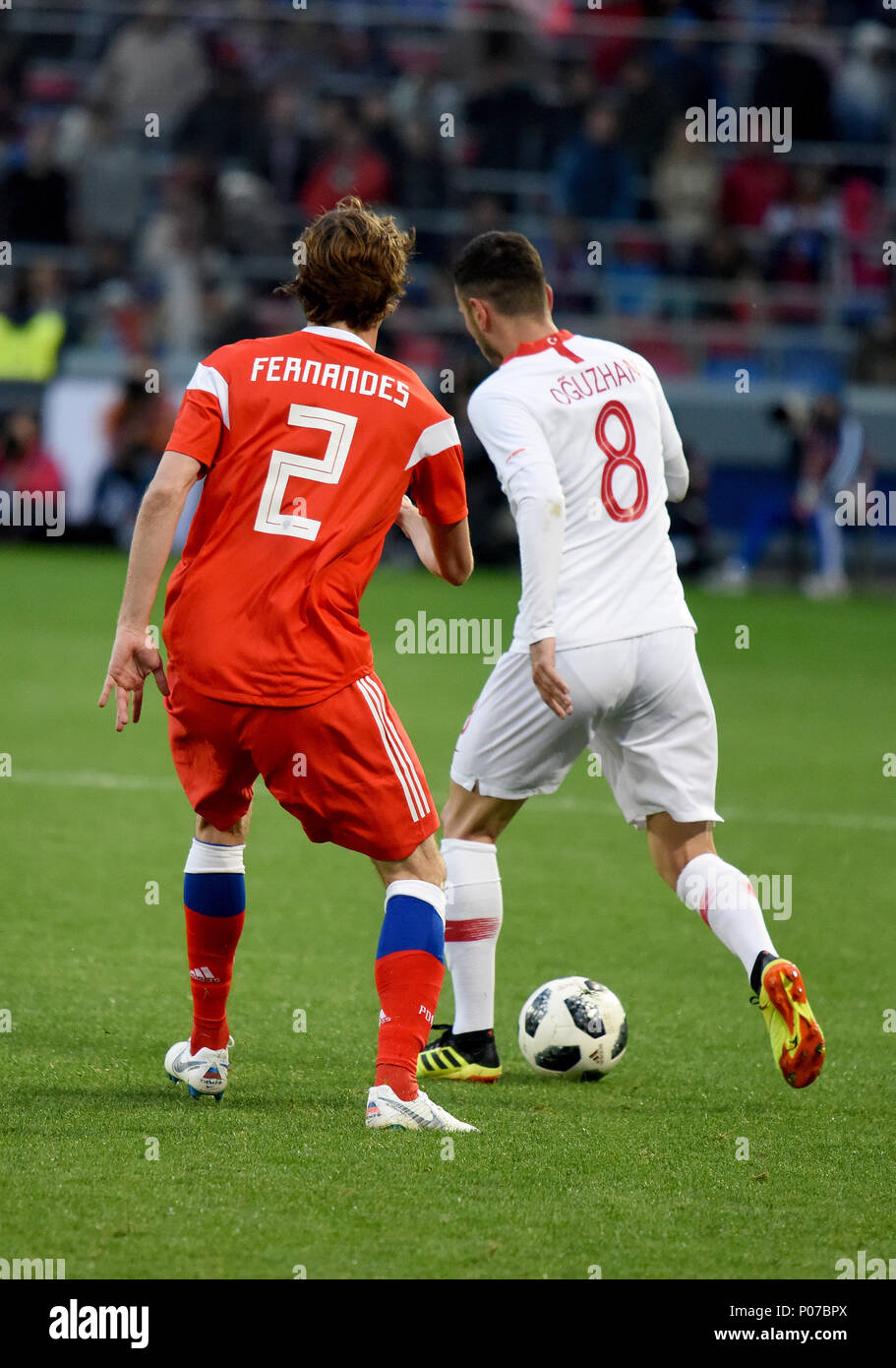 Moscow, Russia - June 5, 2018. Turkish midfielder Oguzhan Ozyakup and Russian defender Mario Fernandes during international friendly against Russia at Stock Photo