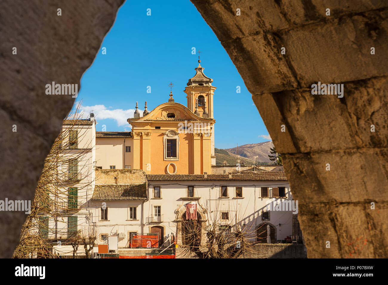 View from the arch of the aqueduct on the Piazza Garibaldi of Sulmona and people strolling Stock Photo