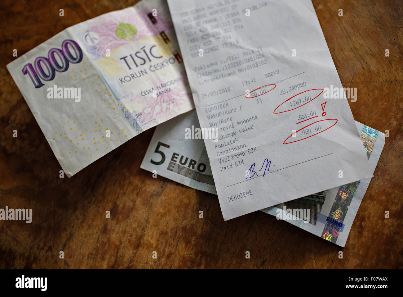 exchange receipt with extreme commission 25,88 % in Prague, money, cash, banknote, Czech crowns, euro Stock Photo