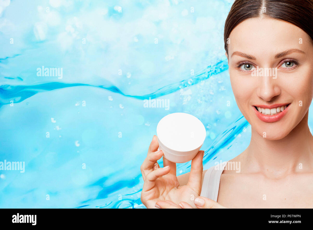 Luxury cosmetic ads,face cream, beauty, woman isolated on bokeh background. Stock Photo