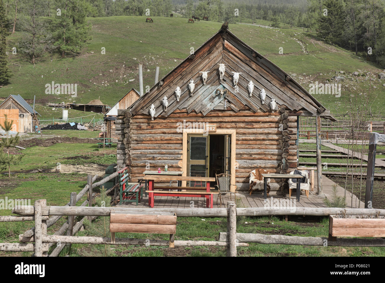 Wood home in ethnic Tuvan village, Kanas Lake National Park, Xinjiang, China Stock Photo