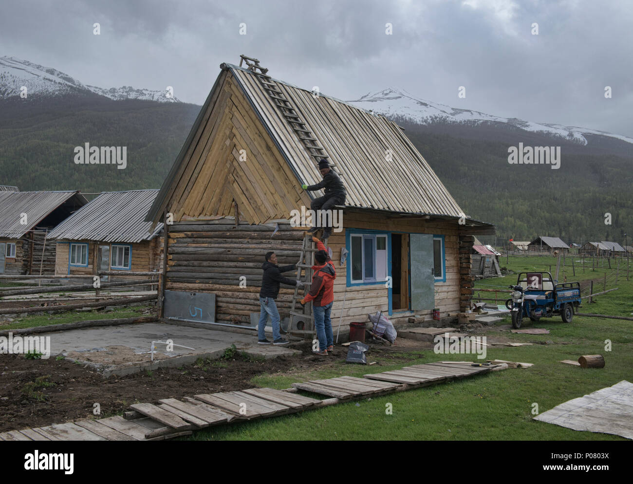 Wood home in ethnic Tuvan village, Kanas Lake National Park, Xinjiang, China Stock Photo