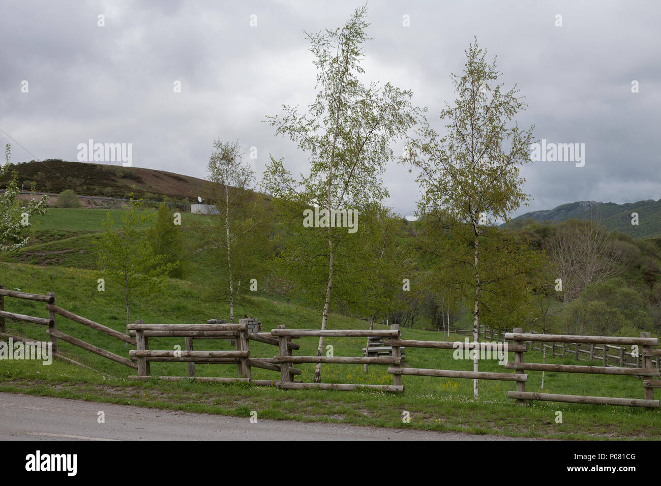 Rural road fence clouds in hi-res stock photography and images - Alamy