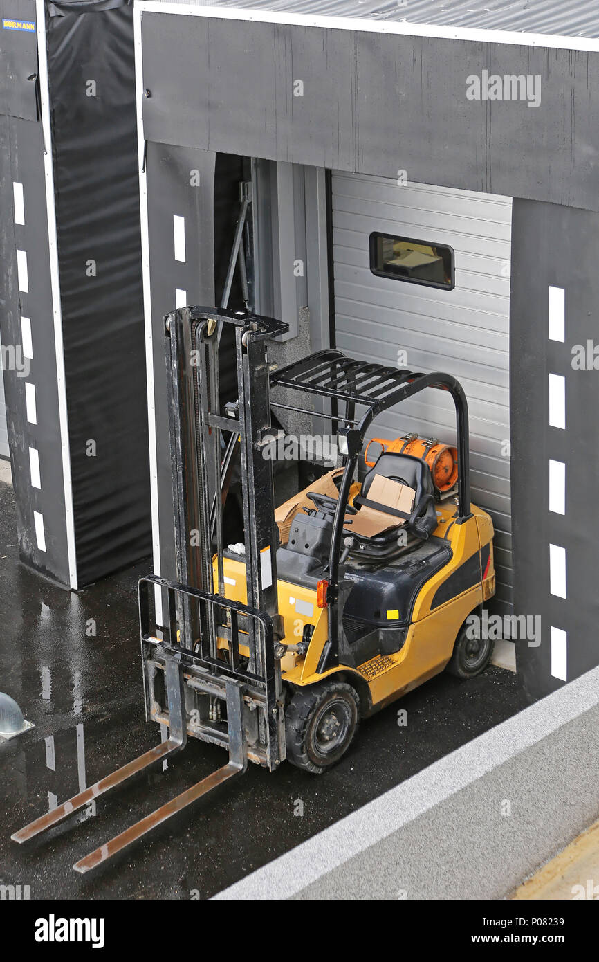 Forklift at Loading Dock Door Distribution Warehouse Stock Photo Alamy
