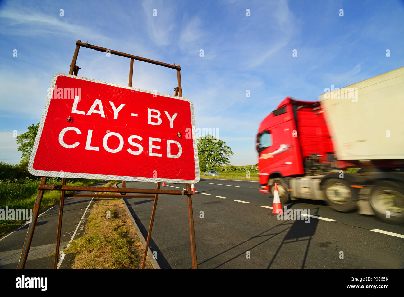 lorry paasing closed lay by sign leeds united kingdom Stock Photo