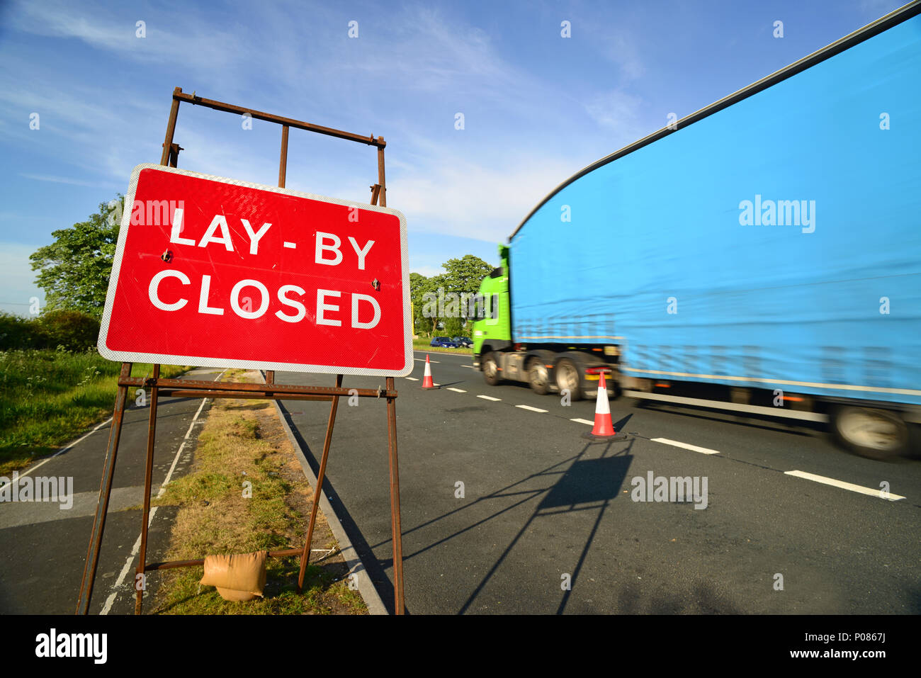 lorry paasing closed lay by sign leeds united kingdom Stock Photo