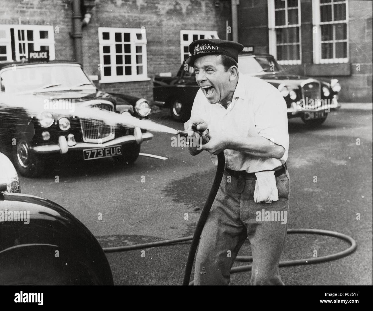 Original Film Title: ON THE BEAT. English Title: ON THE BEAT. Film  Director: ROBERT ASHER. Year: 1962. Stars: NORMAN WISDOM Stock Photo - Alamy