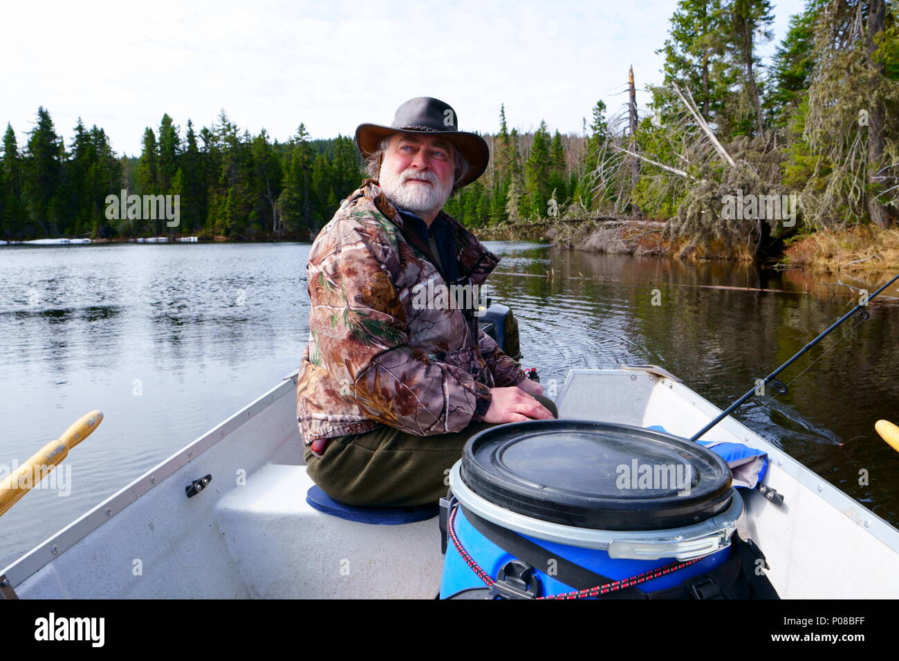 Man driving small boat hi-res stock photography and images - Alamy