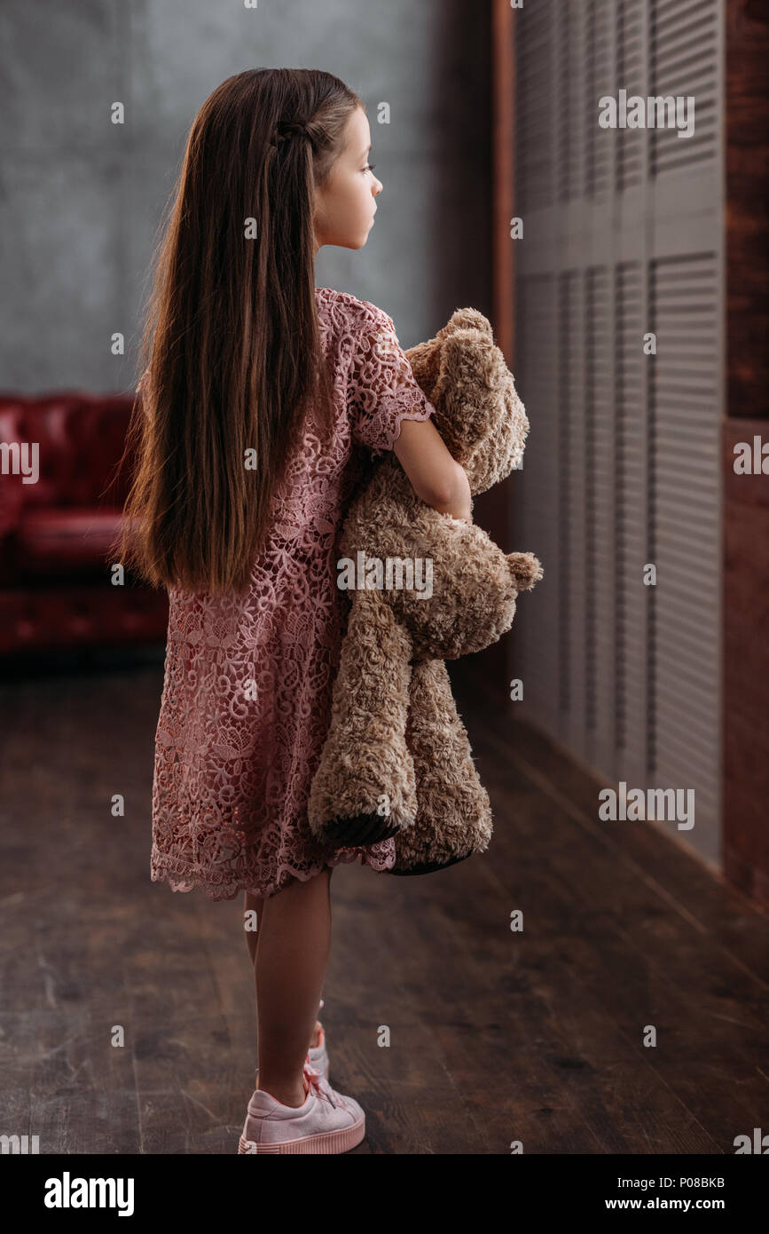 Child holding teddy bear hi-res stock photography and images - Alamy