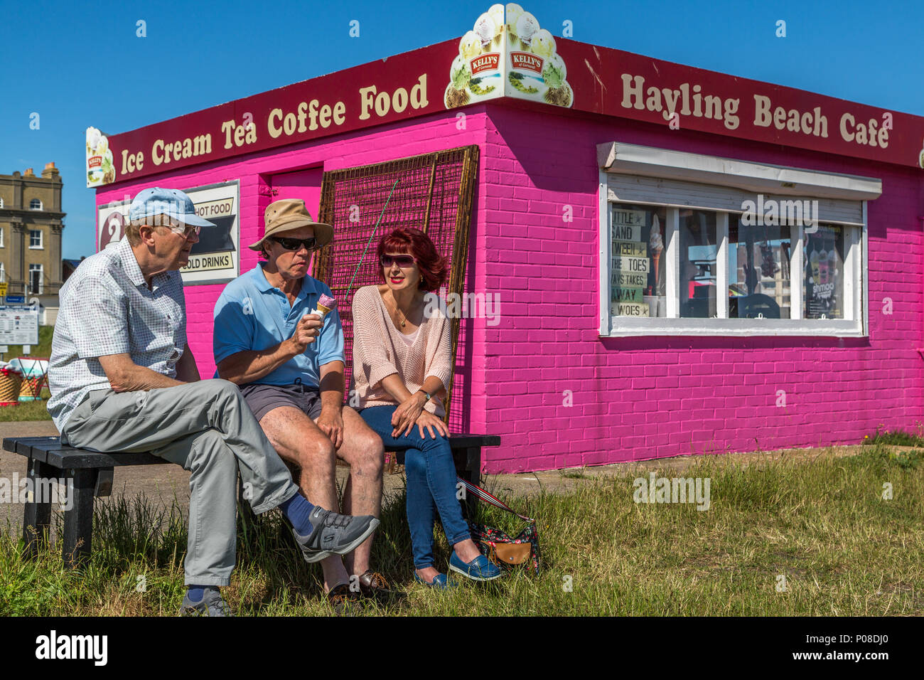 A Family Enjoying A Relaxing Chat And Ice Cream On A Hot Summer June 