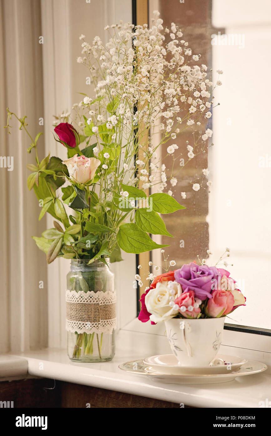 Beautiful teapots with roses Stock Photo Alamy