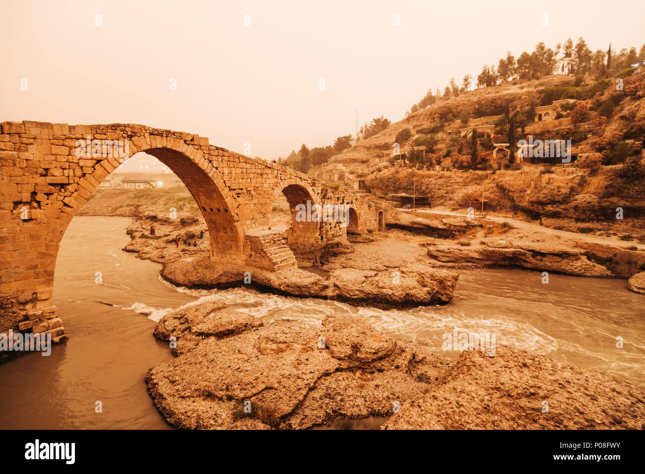 Zakho, Dohuk Governorate, Kurdistan Region of Iraq : Pira Delal ancient stone bridge in the border town of Zakho. Stock Photo