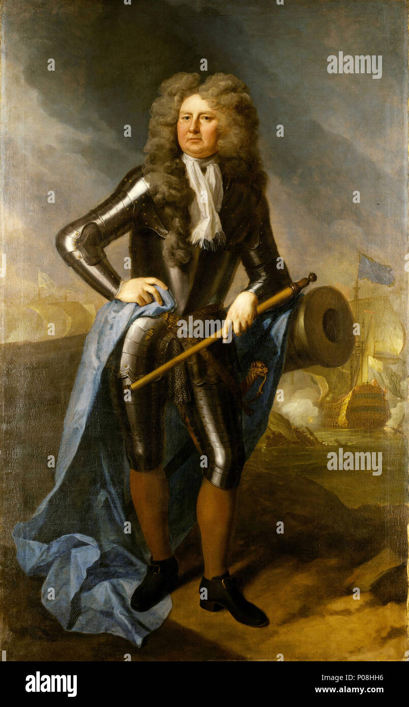 .  English: Admiral Sir Cloudesley Shovell, 1650-1707 Full-length portrait of Sir Cloudesley Shovell, Admiral of the Fleet, leaning to the right and facing slightly to the left, wearing three-quarter length armour and a full-bottomed wig. He is leaning on a cannon which is probably draped with a blue flag, and in his left hand he holds a combined telescope and baton. In the right background, his flagship is shown in action, blue at the main. In the War of the Spanish Succession, he brought home the silver captured by Sir George Rooke at Vigo in 1702. Returning home from an attack on Toulon in  Stock Photo