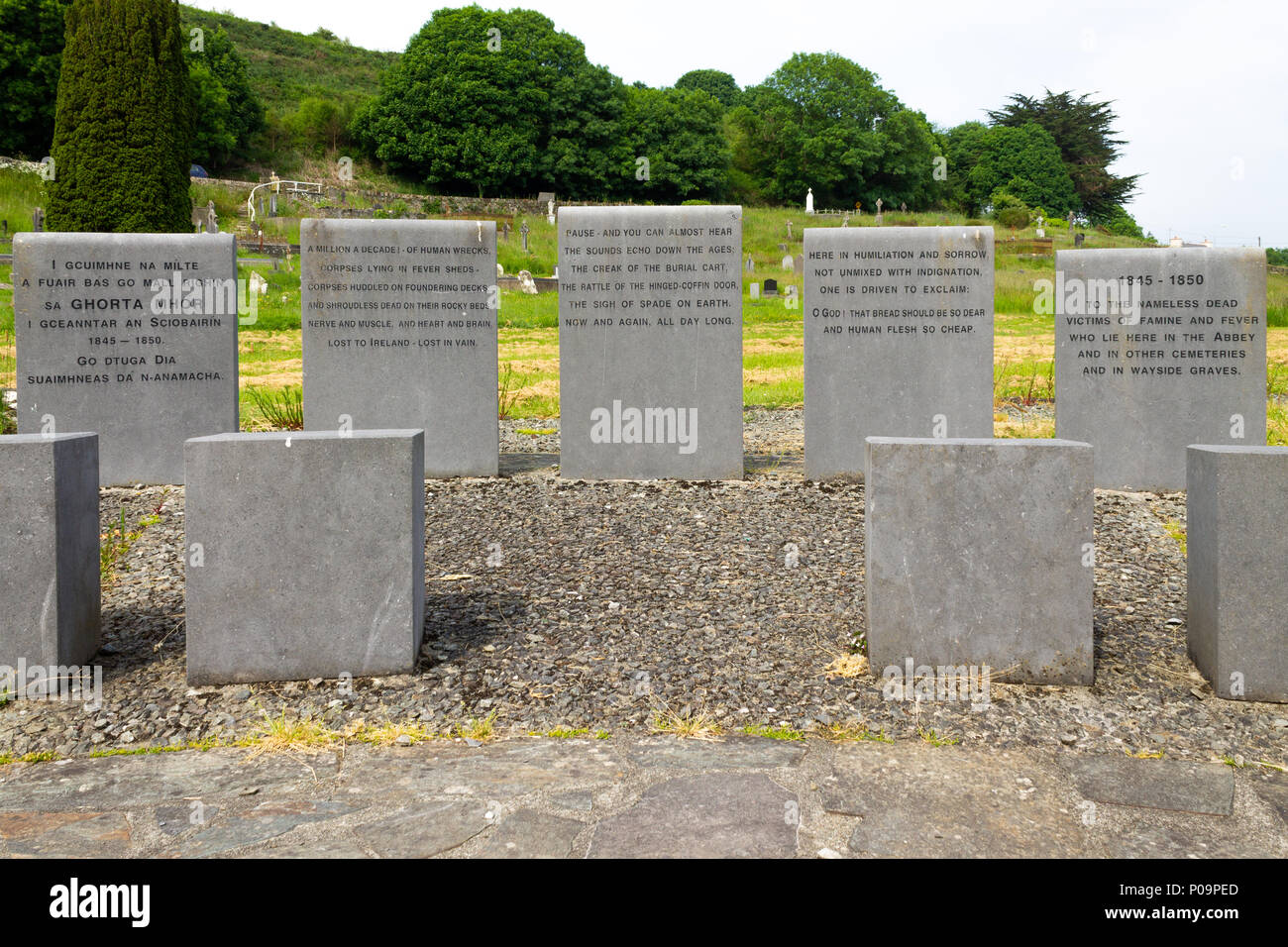 Irish famine burial site with commemorative plaques at abbeystrewry cemetery skibbereen, Ireland. Stock Photo