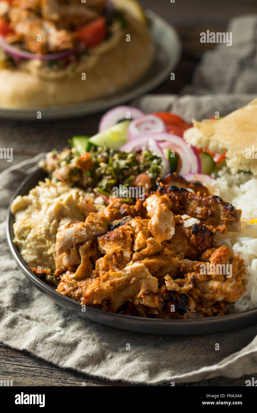 Homemade Doner Kebab Plate with Hummus Rice and Pita Stock Photo
