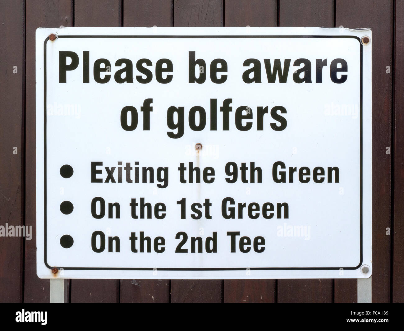Please Be Aware of Golfers sign at The Old Golf Course in Musselburgh, East Lothian, Scotland, one of the oldest golf courses in the world. Stock Photo