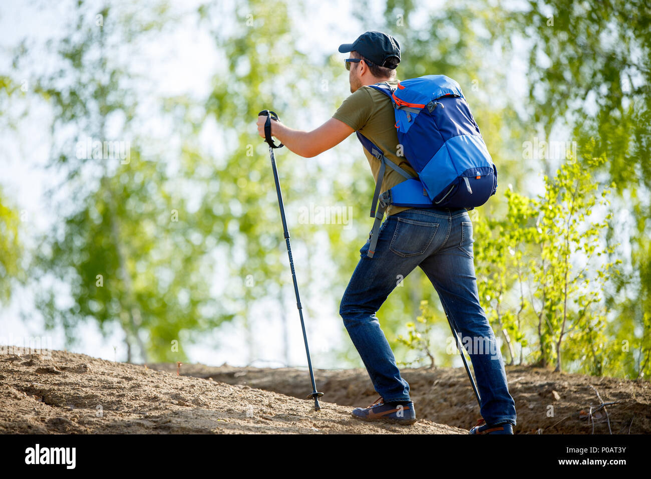 Back view athletic man walking hi-res stock photography and images - Alamy