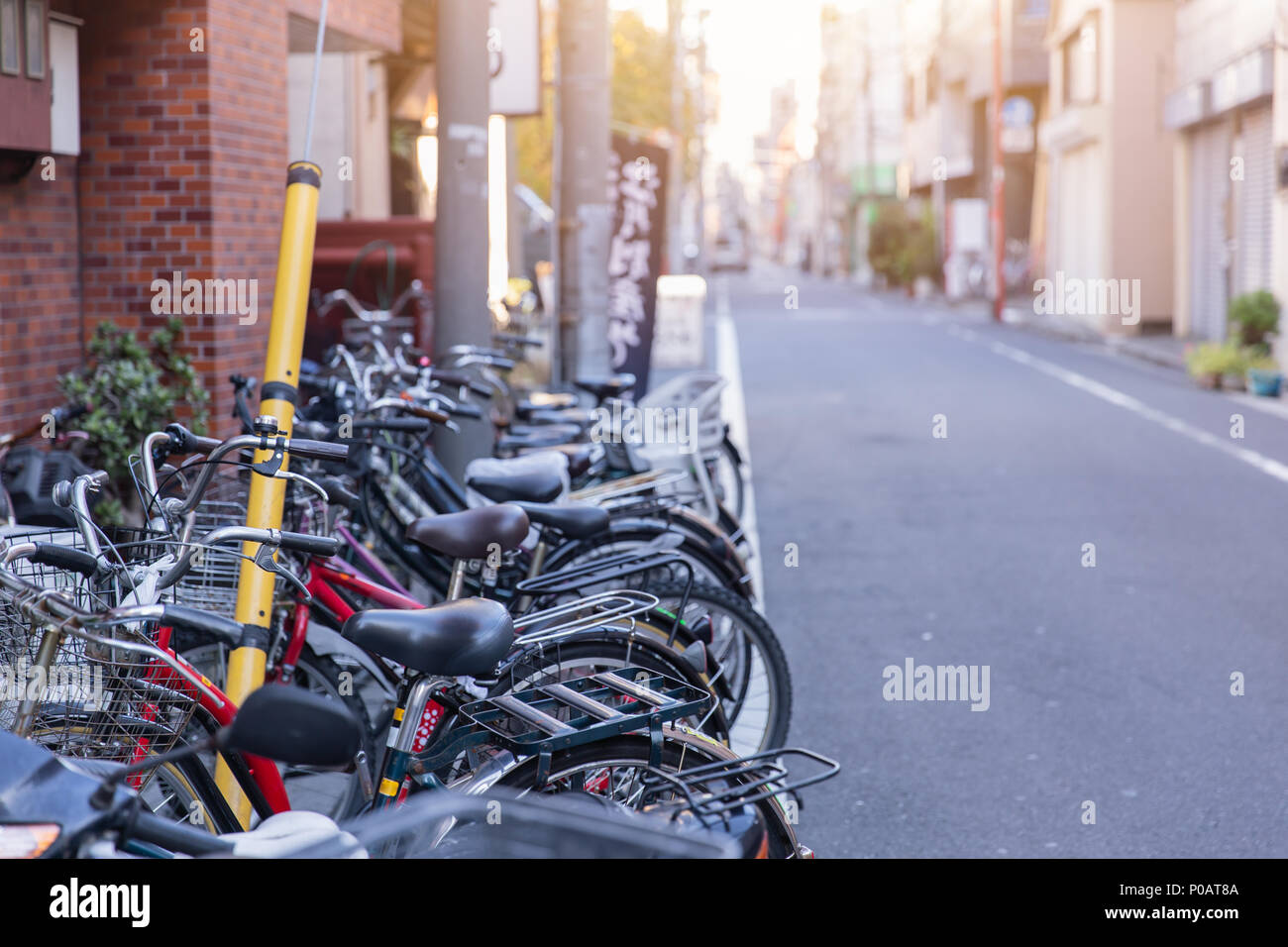 Bike parking at road side in Tokyo japan Stock Photo