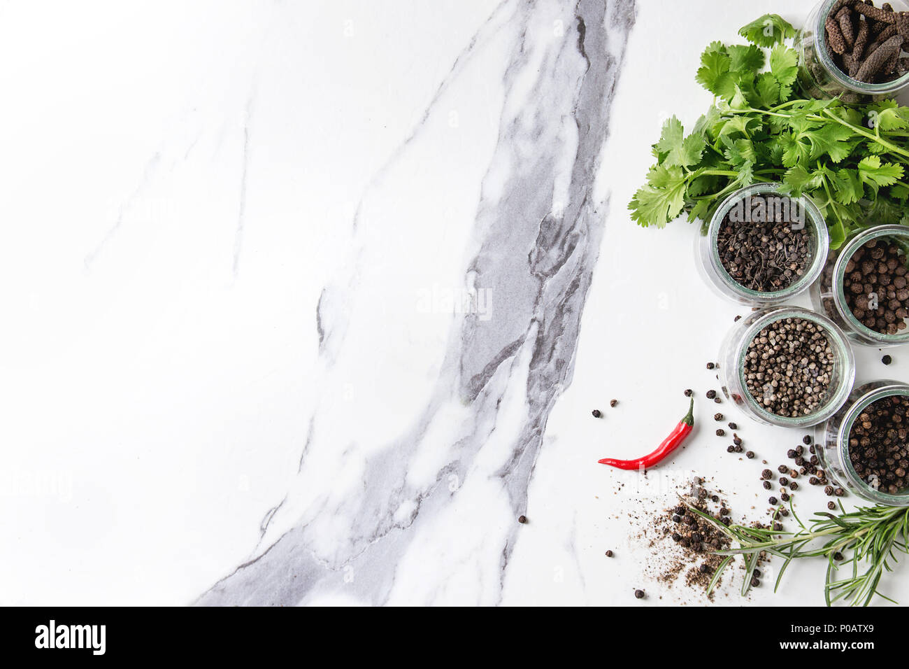 Variety of black peppers Stock Photo Alamy