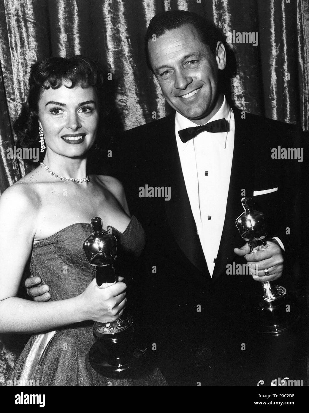 Description: The 26th Academy Awards / 1954.   William Holden, best actor for 'Stalag 17'. Donna Reed, best actress in a supporting role for 'From Here to Eternety'..  Year: 1954.  Stars: DONNA REED; WILLIAM HOLDEN. Stock Photo