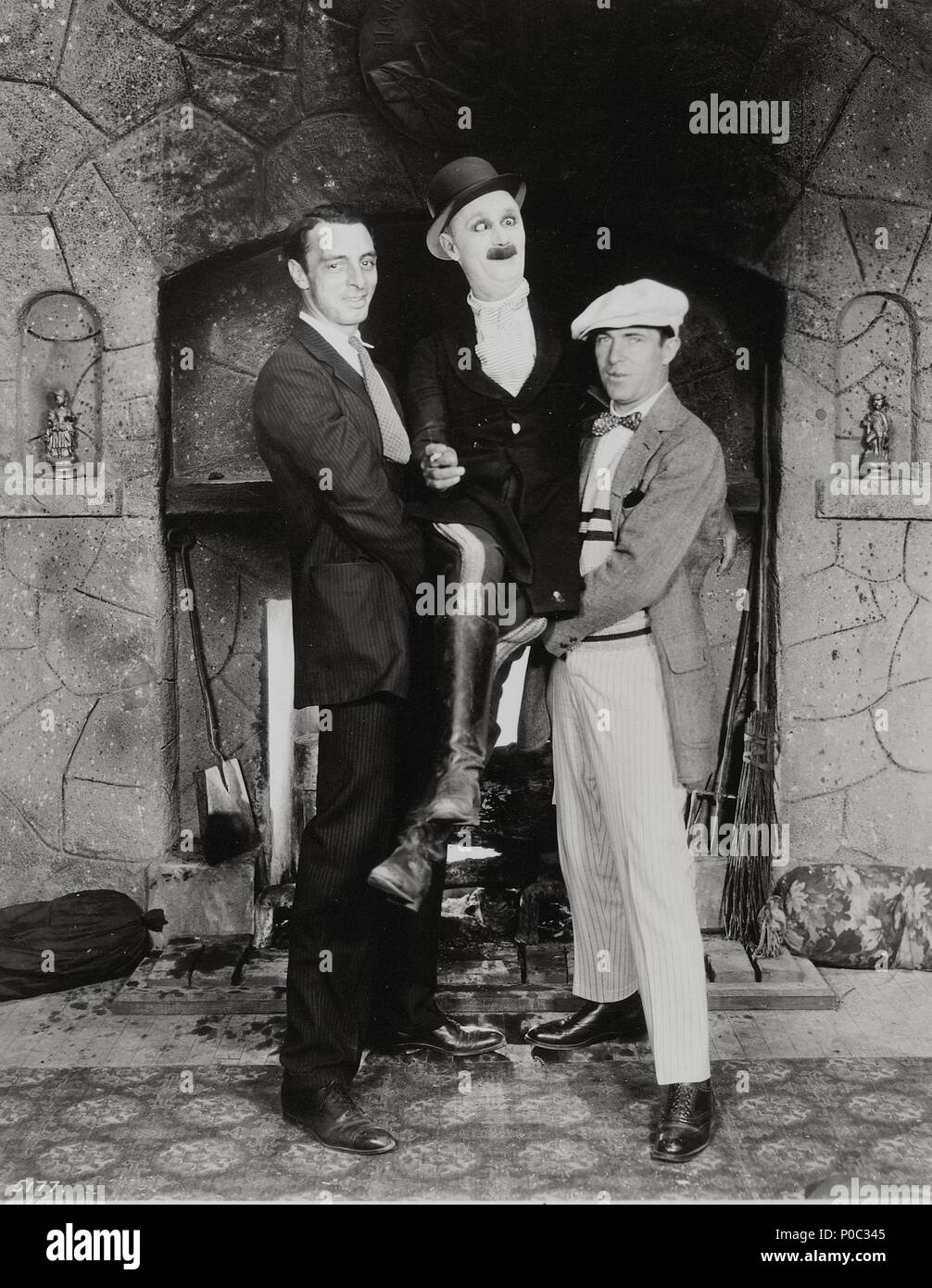 Description: Comedy actors of the Mack Sennett Comedies Corporation posing..  Original Film Title: MACK SENNETT COMEDY.  English Title: MACK SENNETT COMEDY.  Stars: ARTHUR RIPLEY; BEN TURPIN. Stock Photo