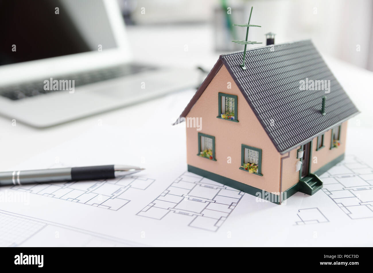 House model on desk, mortgage, investment or house building concept Stock Photo