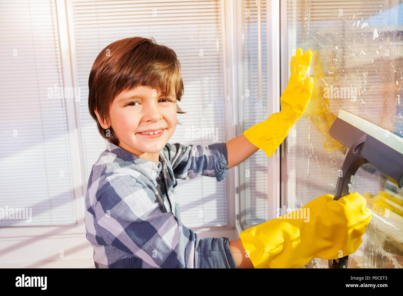 Kids washing up gloves hires stock photography and images Alamy