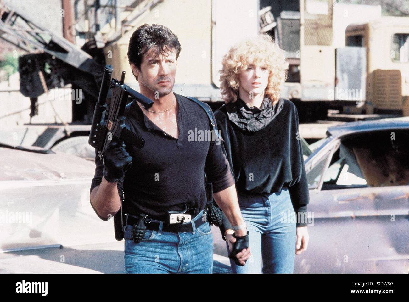 sly stallone in cobra movie guns used by