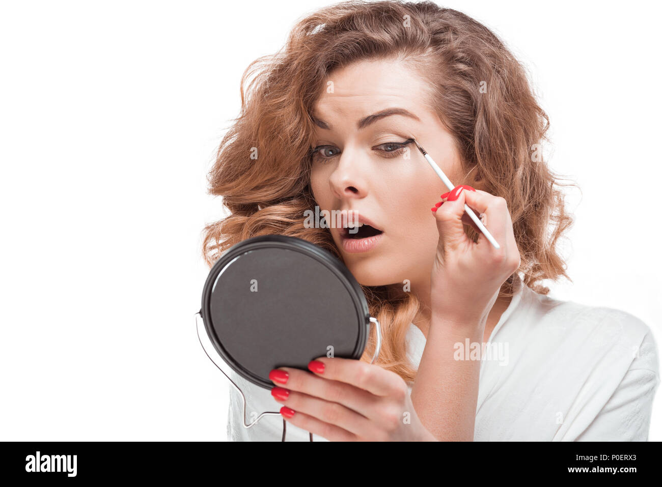 Putting on eyeliner hi-res stock photography and images - Alamy
