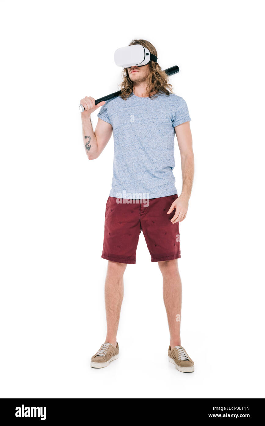 young man in virtual reality headset holding baseball bat isolated on