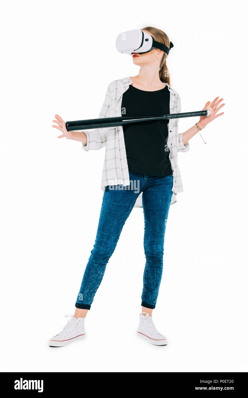 confident young woman in virtual reality headset holding baseball bat