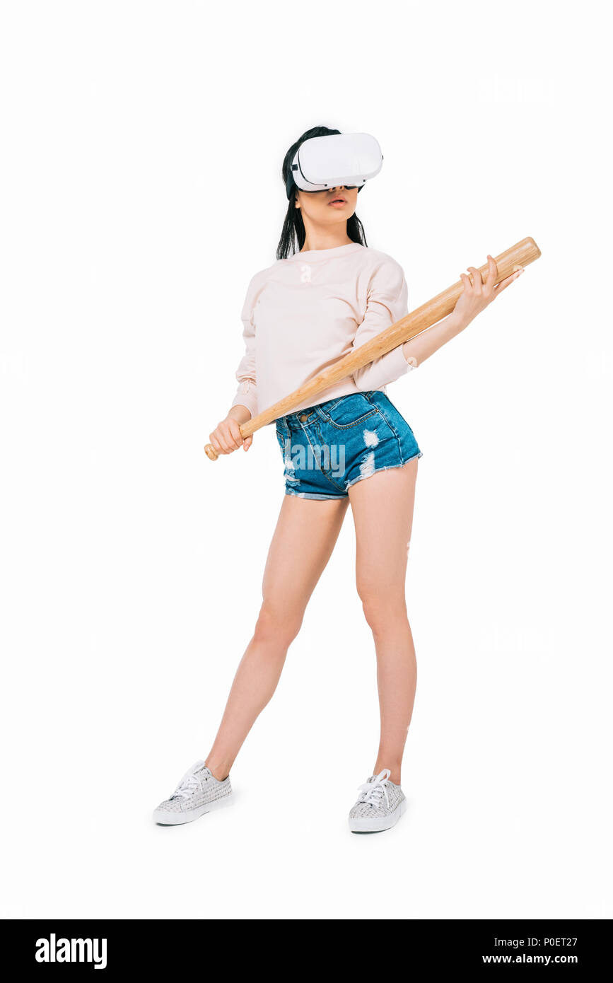 beautiful young asian woman in virtual reality headset holding baseball