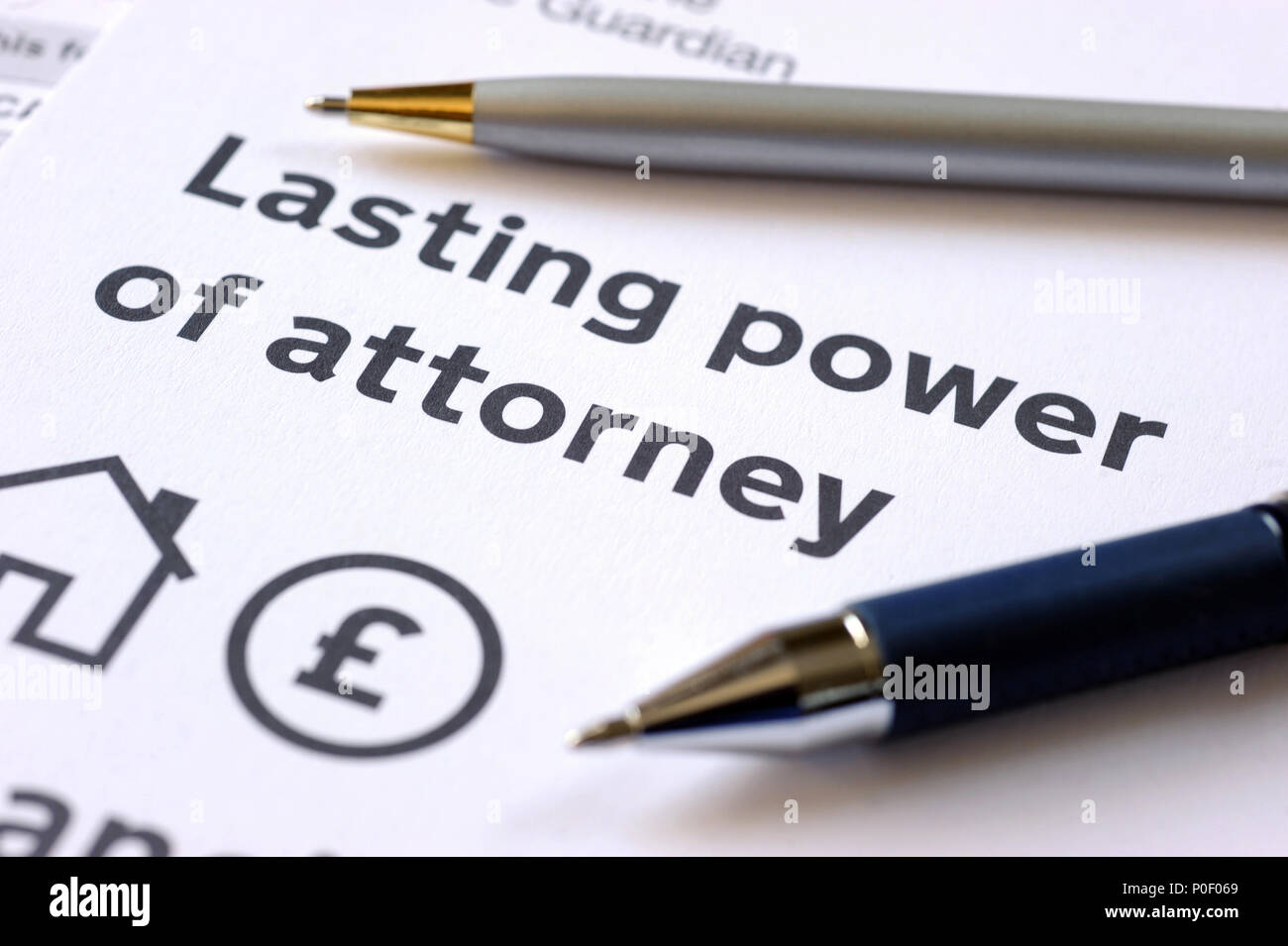 LASTING POWER OF ATTORNEY FORMS WITH PENS RE OFFICE OF THE PUBLIC GUARDIAN DEATH WILLS MAKING A WILL FAMILY UK Stock Photo