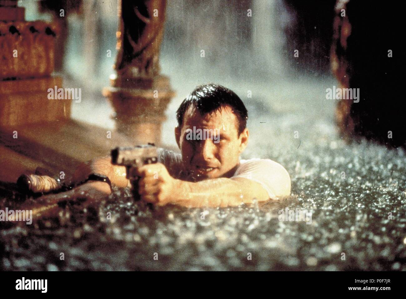 Original Film Title: HARD RAIN. English Title: HARD RAIN. Film Director:  MIKAEL SALOMON. Year: 1998. Stars: CHRISTIAN SLATER. Credit: POLYGRAM /  Album Stock Photo - Alamy