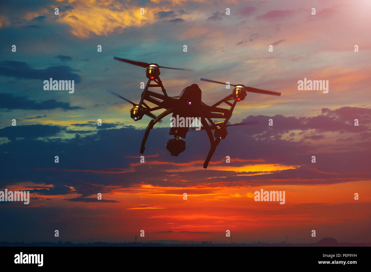 Drone flying over beautiful morning a sunset sky with light clouds ...