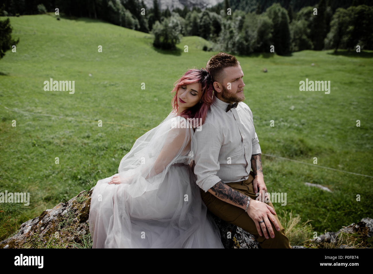 Attractive bride groom sitting on hi-res stock photography and images ...