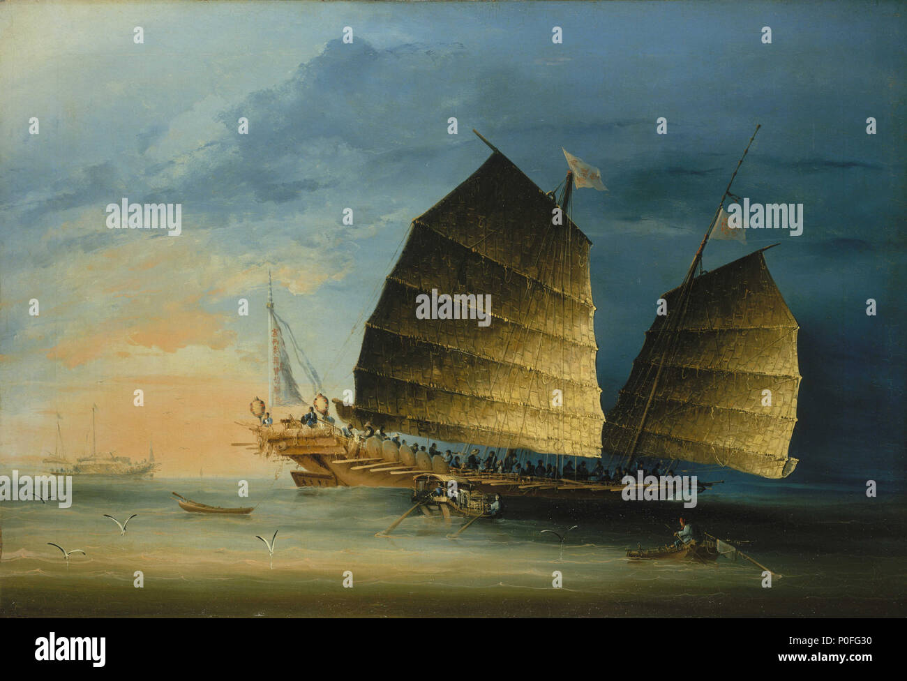 .  English: A war junk A 19th century portrait of a Chinese war junk dated about 1850. Throughout China's history, junks have been used as war ships. They usually have two or three sails and each mast is made of bamboo because of its strength. This junk is shown in full sail with a large number of figures on board. The warrior’s shields can be seen fixed to the side of the junk in between all the oars. Two lanterns are positioned at the stern with a small cannon in between and there are several guards visible. Small local craft can be seen near the ship, the one to the right is obviously a fis Stock Photo