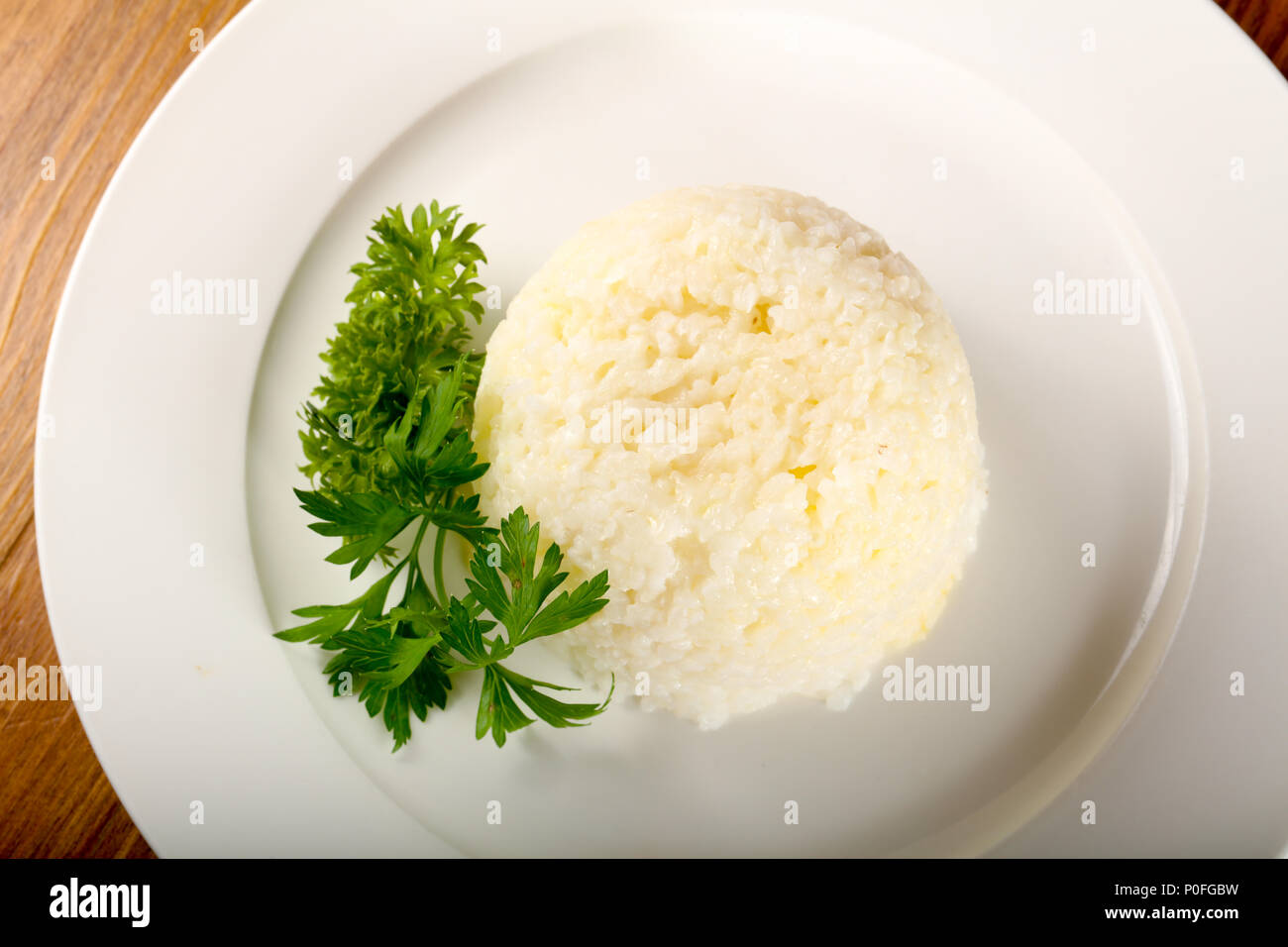 Steamed rice with parsley Stock Photo - Alamy