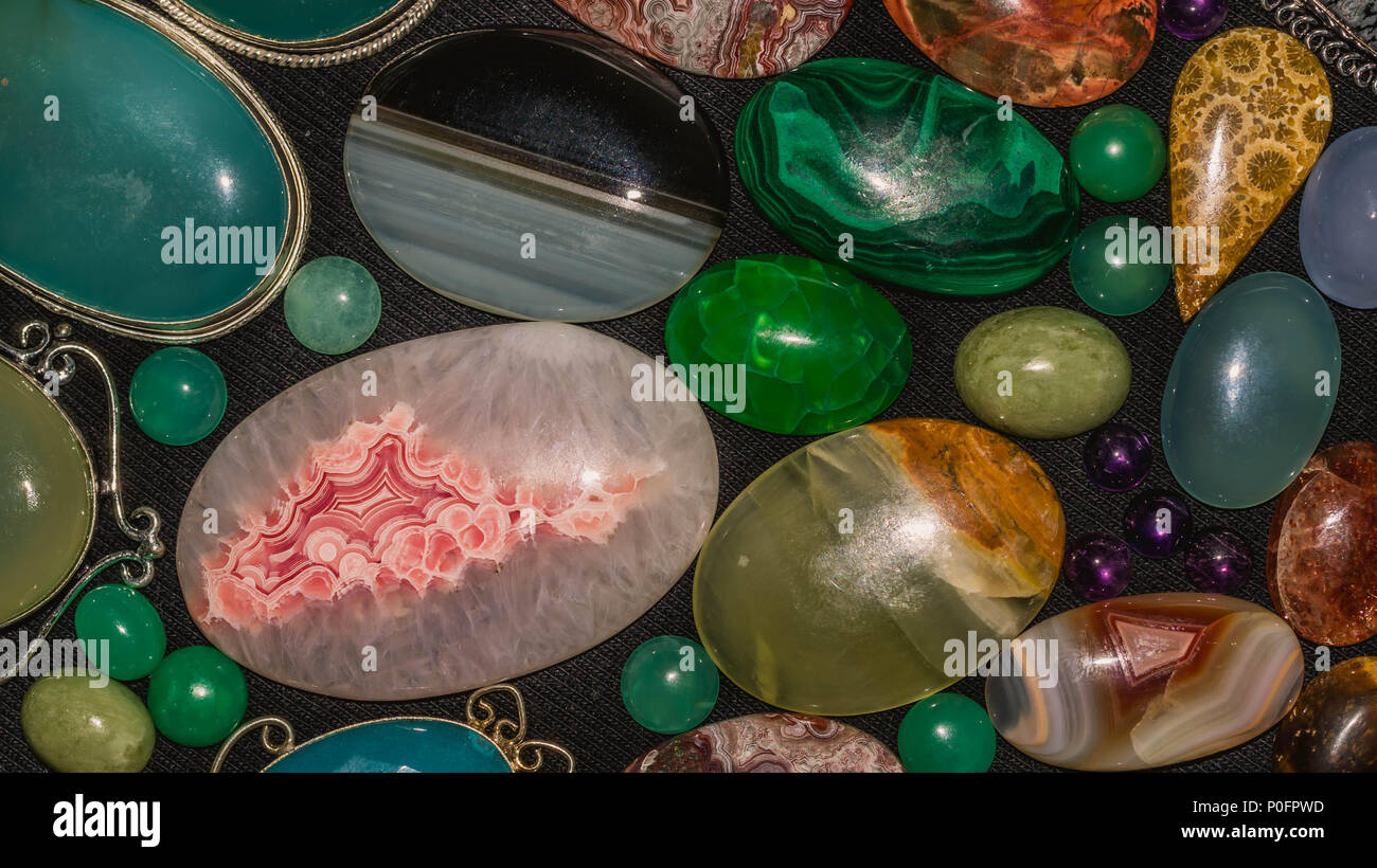 assorted colorful gemstone cabochon. geology and mineral background ...