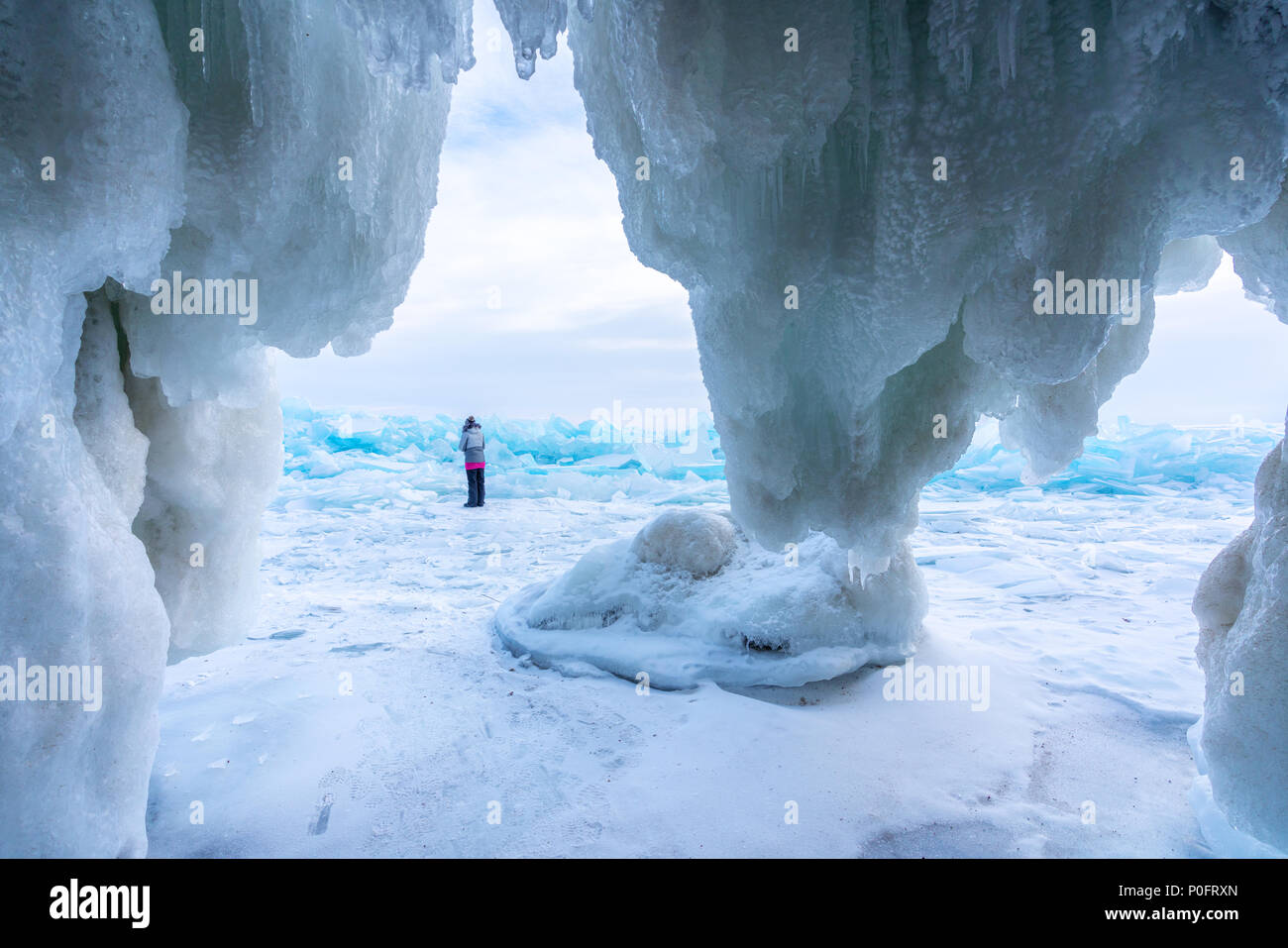 Frozen ice cave at frozen lake Baikal in Siberia, Russia Stock Photo