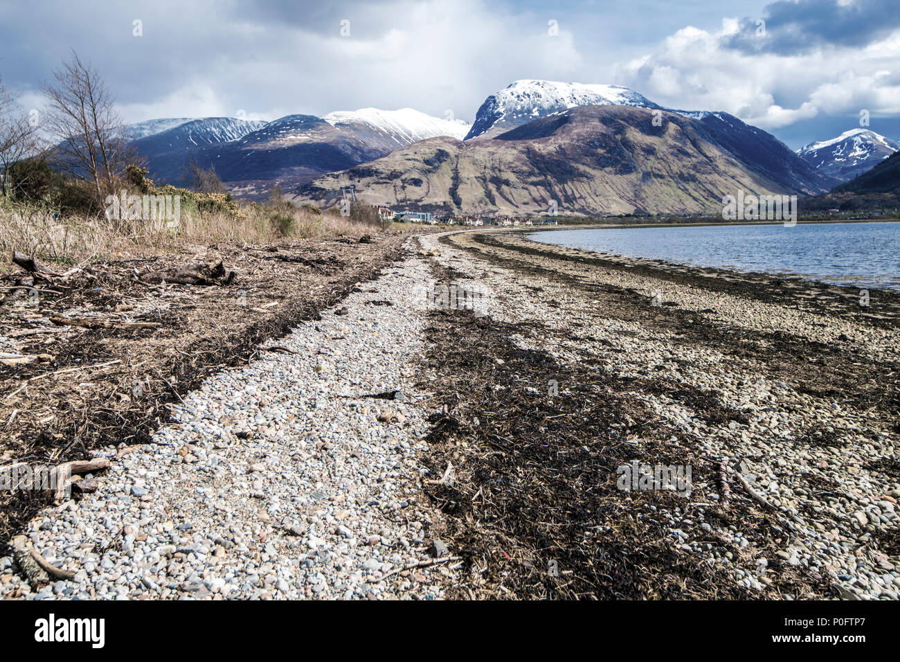Tide marks showing a series of tides on the shore of Loch Linnhe near