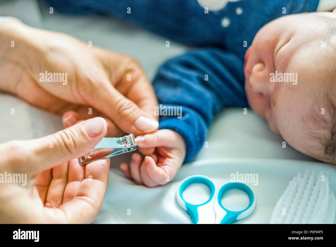 cutting newborn fingernails