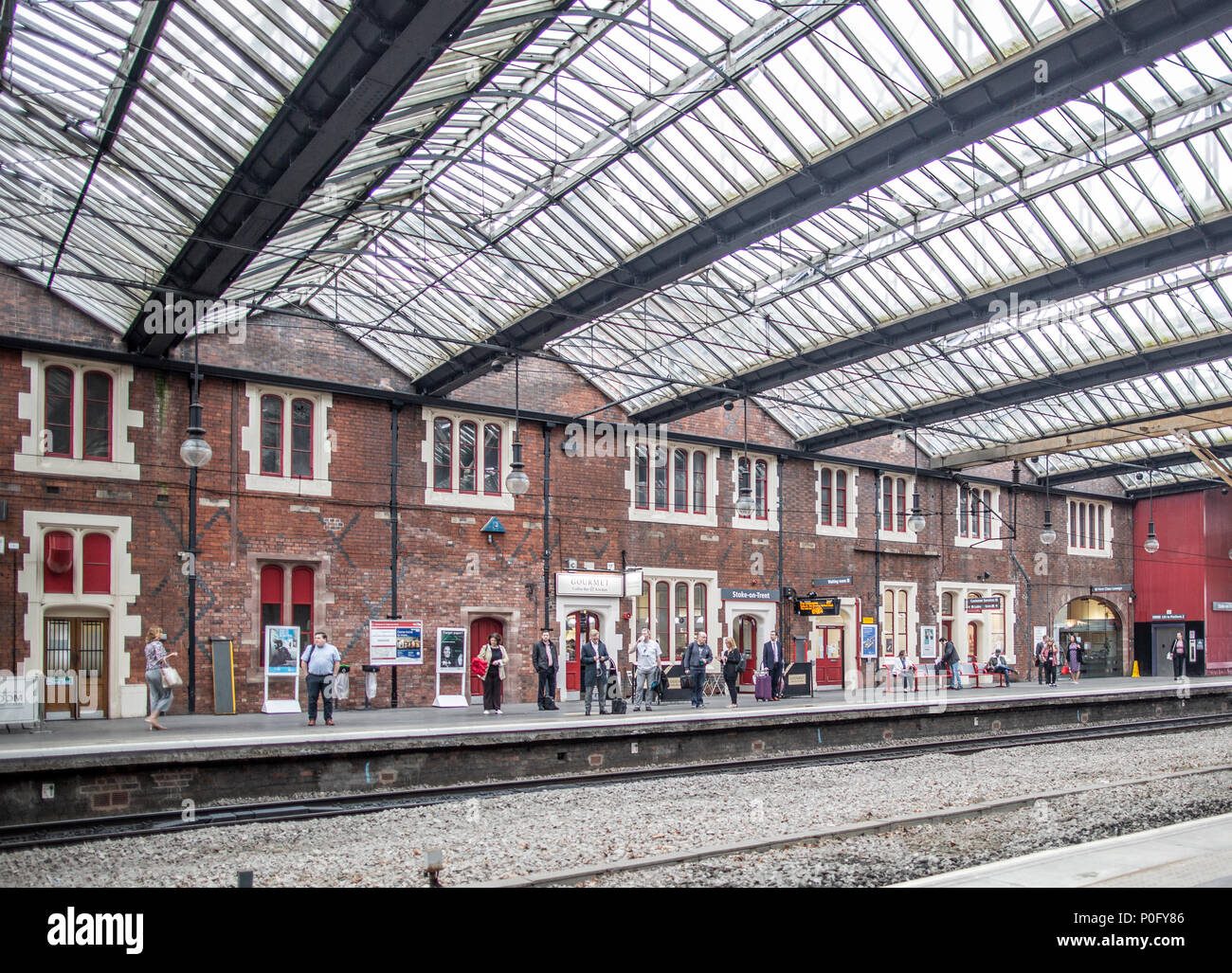 Train station at Stoke on Trent where travellers wait for a virgin train Stock Photo
