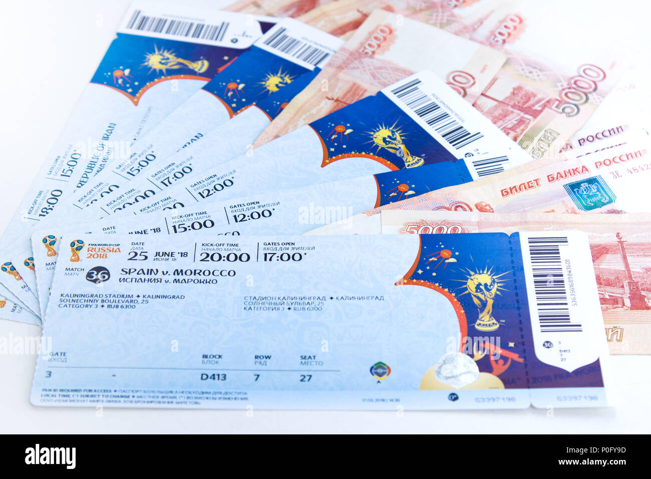 Moscow, Russia - June 8, 2018: Preparing to enter matches of confederations Cup in 2017 and World Cup 2018 in Russia. Tickets and russian rubles Stock Photo