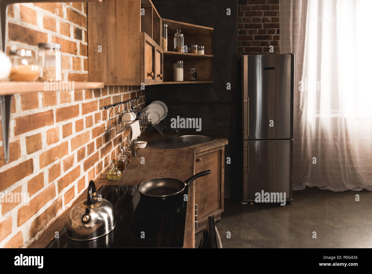 modern kitchen interior with utensils and appliances Stock Photo - Alamy