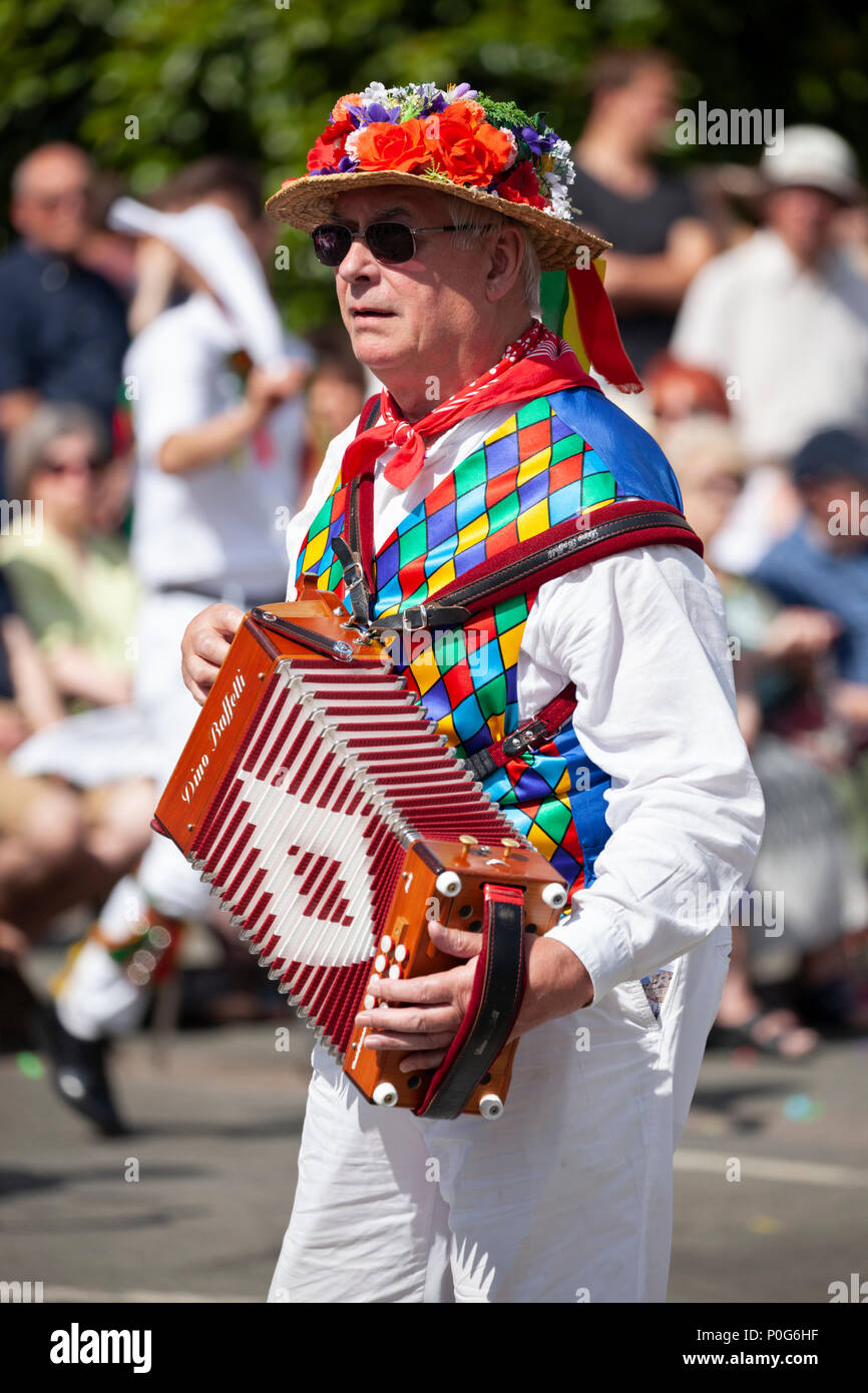 Accordion playing Morris dancer at the Scuttlebrook Wake, Chipping Campden, Cotswolds, Gloucestershire, England, United Kingdom, Europe Stock Photo