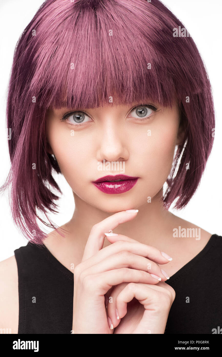 Portrait Of Thoughtful Woman With Purple Hair Looking At Camera