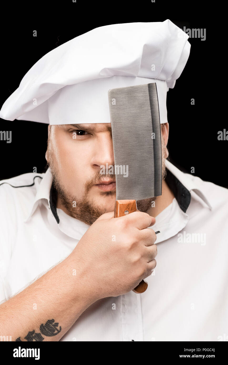Serious chef holding knife hi-res stock photography and images - Alamy