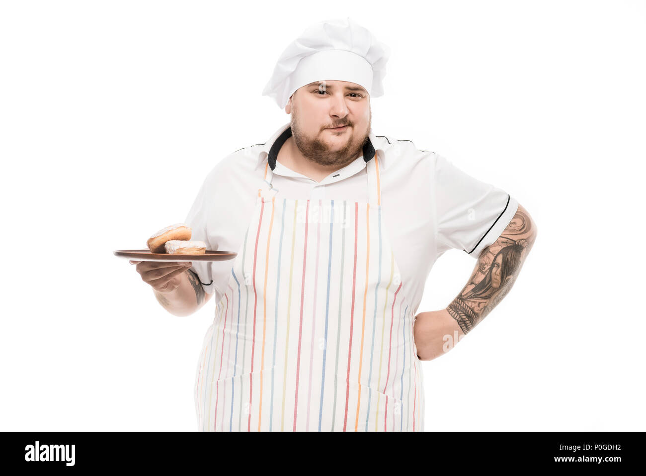 Un Uomo In Un Cappello Da Cuoco Che Frigge Donuts - Fotografie