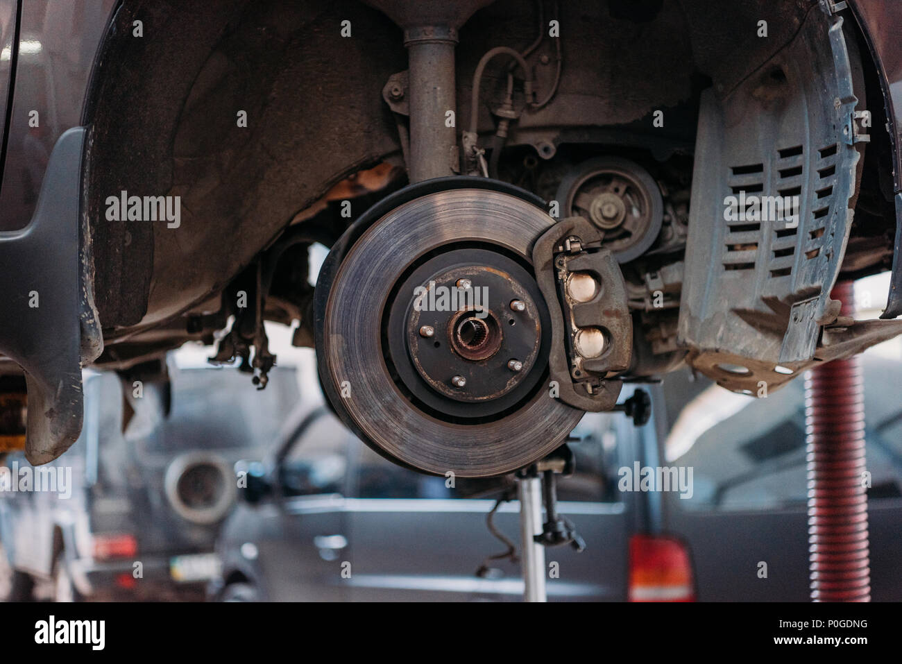 Close up of a Car in a service with brake shoe exposed. Stock Photo